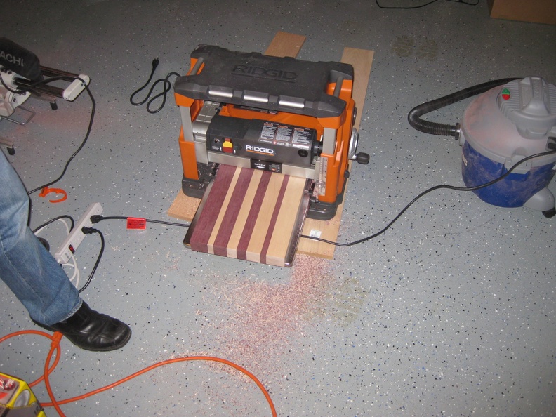 5 smoothing out the glued boards with a planer.JPG